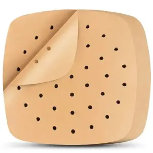 Eckige beige Einlage mit Löchern, eine Ecke ist aufgerollt