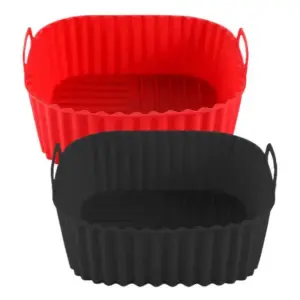 Rote und schwarze ovale Silikonschalen mit gewelltem Rand